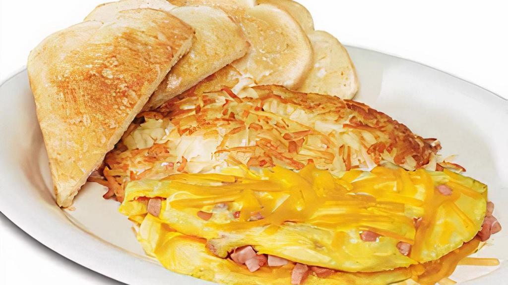 Country Ham & Cheddar Omelette · Taste the cheesy goodness that blends perfectly with the hearty flavor of our country ham. Served with choice of two breakfast sides.