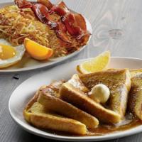 Brioche French Toast Combo · Rich brioche bread makes our French toast light, fluffy and decadent; dipped in our French t...