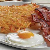 Traditional Breakfast · A farm-fresh egg and Applewood-smoked bacon or sausage. With your choice of two buttermilk p...
