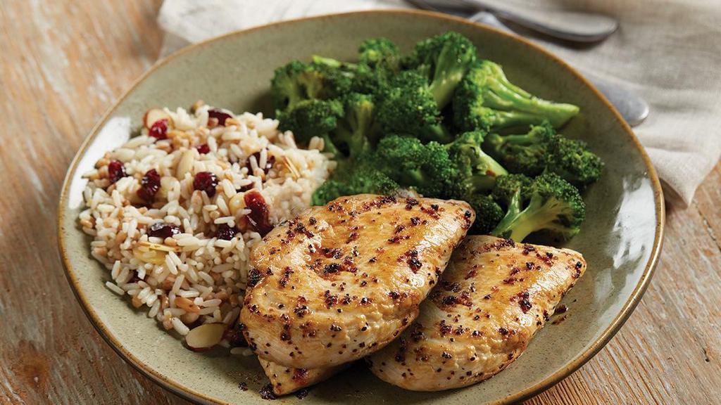 Grilled Lemon Chicken · Light but full of flavor! A lemon-pepper chicken breast grilled to juicy perfection. Served with choice of two dinner sides.