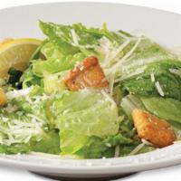 Caesar Salad · Romaine lettuce tossed in our delicious Caesar dressing, tossed with Parmesan cheese and cru...