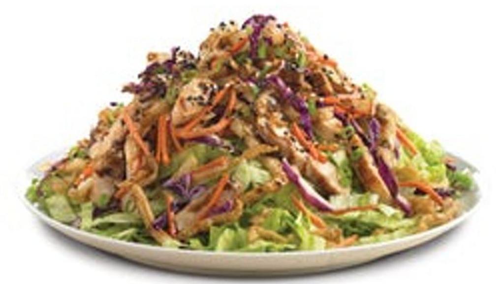 Spicy Asian Salad · Diced chicken breast, crispy wontons, carrots . and red cabbage tossed in our signature Asian . dressing and placed over a bed of fresh lettuce. . Topped with toasted sesame seeds and green . onions. NEW!
