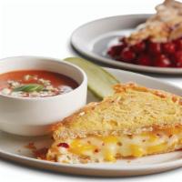 Parmesan-Crusted Grilled Cheese Duo · Half Parmesan-Crusted Grilled Cheese paired with a cup of soup or house salad. Make it a tri...