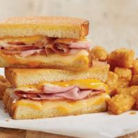 Grilled Ham & Four Cheese Melt Duo · Half Grilled Ham & Four Cheese Melt paired with a cup of soup or house salad. Make it a trio...