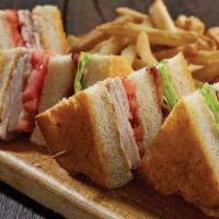 Turkey Bacon Club · Hand-carved turkey breast, Applewood-smoked bacon, crisp lettuce, fresh tomatoes and mayo on...