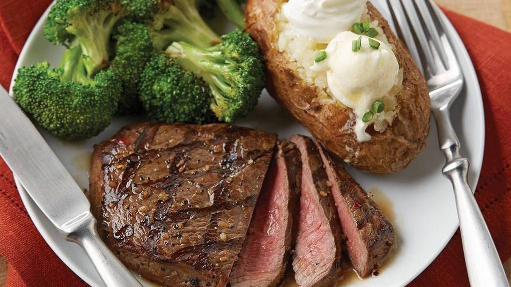 Grilled Top Sirloin* · Tender, juicy and flavorful, our grilled 6oz top sirloin* is always a delicious choice. Served with choice of two dinner sides and a dinner roll.