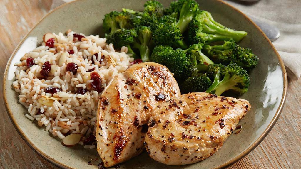 Lemon Chicken · Two lemon-pepper chicken breasts grilled to perfection. Served with choice of two sides.