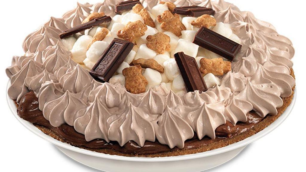 Whole S'mores Galore Pie · Since the 19th Century, gourmet pastry chefs have preferred Guittard chocolate for its quality ingredients. This pie takes that classic summer treat to a new level with the marshmallows gently blended in the fine chocolate filling. with smooth marshmallow to take you back to those. summers on the lake.  Due to limited quantities, only 2 per order, please.