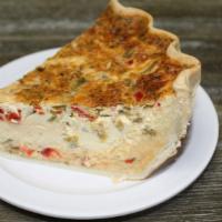 Southwestern Quiche · Cooked with cream, eggs, green Chile, red roasted pepper and cheese.