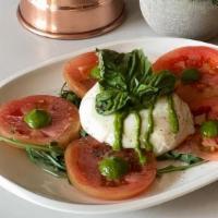 Caprese Salad · Organic seasonal tomatoes, fresh burrata, basil pesto