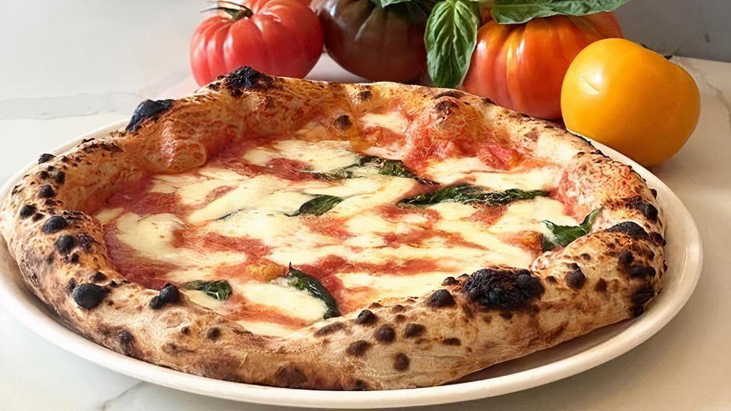 Pizza Margherita · Fresh basil, tomato sauce, fior di latte & evoo
