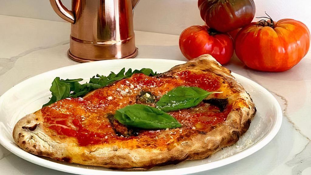 Pizza Calzone · Stuffed pizza, mozzarella, prosciutto, salami and ricotta cheese