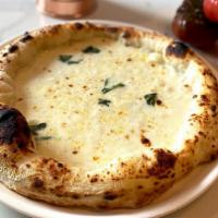 Pizza 4 formaggi · Fior di latte, gorgonzola, parmigiano & smoked provolone