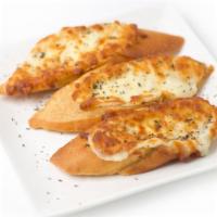 Garlic Bread with Cheese · Fresh baked garlic bread topped with cheese and made to perfection.