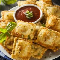 Toasted Raviolis · Fresh baked ravioli twisted and cooked to perfection.