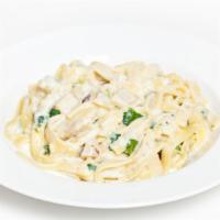 The Fettuchini Alfredo · Homemade alfredo sauce tossed with fettuccine noodles, topped with parmesan cheese.