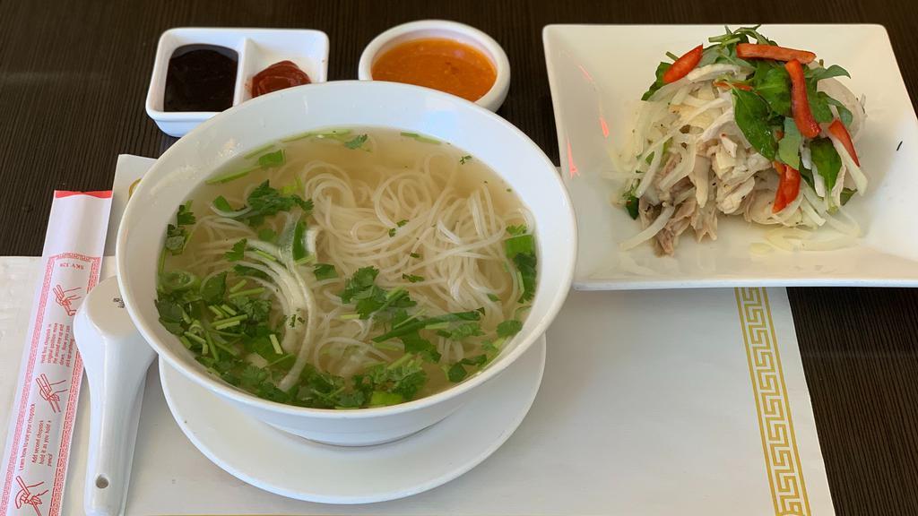 14. Pho Xe Phay · Hand shredded chicken salad with rice noodle soup.
