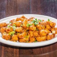 Chilli Baby Corn · Signature dishes. Spicy level 1. Crispy baby corn, onions, and spicy tangy sauce.