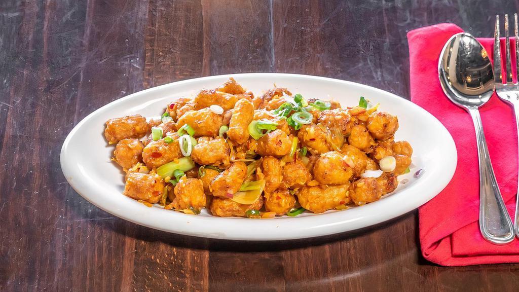 Chilli Baby Corn · Signature dishes. Spicy level 1. Crispy baby corn, onions, and spicy tangy sauce.