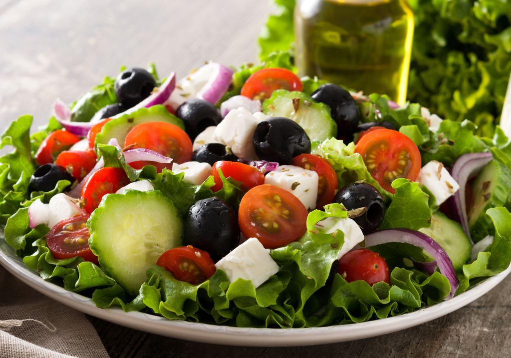 Greek Salad · Lettuce, Tomatoes, Onions, Cilantro, Feta cheese, and House dressing.