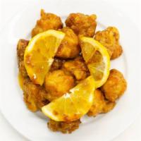 Lemon Pepper Chicken Wings · Deep fried chicken wings tossed in a citrusy and peppery seasoning.