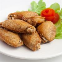 Salt & Pepper Chicken Wings · Classic salt and black pepper topped on fresh batch of chicken wings.