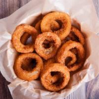 Onion Rings · Golden crispy onion rings fried.