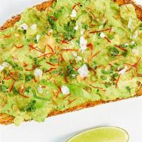 Avo Toast · Rockenwagner thick-cut multigrain, avocado, chives, dried chile threads, fresh lime