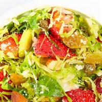 Brussels Sprouts, Strawberry And Parmesan · shaved Brussels sprouts, strawberry, almond, parmesan cheese, sage white balsamic vinaigrette