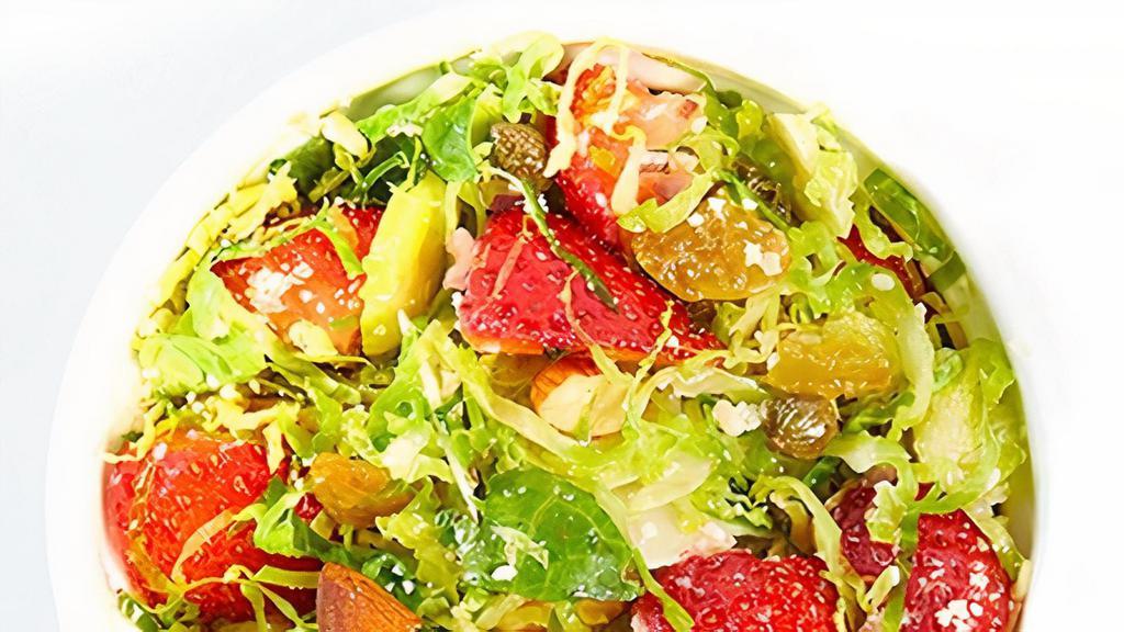 Brussels Sprouts, Strawberry and Parmesan · shaved Brussels sprouts, strawberry, almond, parmesan cheese, sage white balsamic vinaigrette