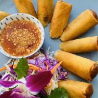 Crispy Vegetable Rolls · (Vegan) Crispy spring rolls with carrots, cabbage, and ground peanuts
