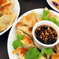 Mushroom Dumplings · (Vegan) Served with ginger sauce