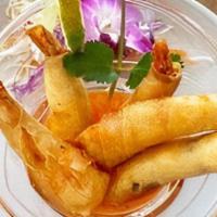 Crispy Shrimp Rolls · Served with sweet and sour sauce.