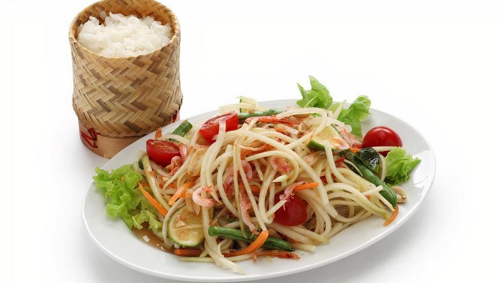 Lao Papaya Salad - Somtum Lao · Does not come with Sticky Rice . Famous Lao-style salad. A bit more funky. Fresh green papaya with lime, garlic, tomatoes, and fermented fish sauce