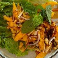 Mango Salad · Fresh mango, red onion, scallions, carrots, cashew nuts, mild Thai chili paste Edamame Tometoe