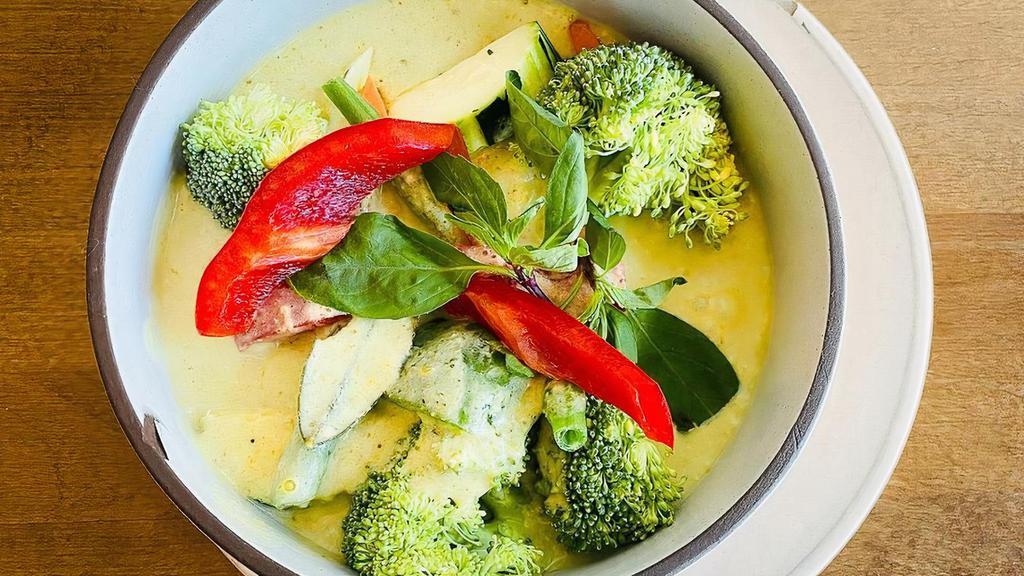 Green Curry with Chicken · (Gluten-Free) Choice of protein simmered in coconut milk, green curry, eggplant, green beans, and Thai basil leaves
