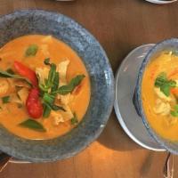Red Curry with Tofu · (Vegan/Gluten-Free) Choice of protein simmered in coconut milk, red curry, bamboo shoots, Th...