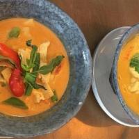 Red Curry Shrimp · (Gluten-Free) Choice of protein simmered in coconut milk, red curry, bamboo shoots, Thai bas...