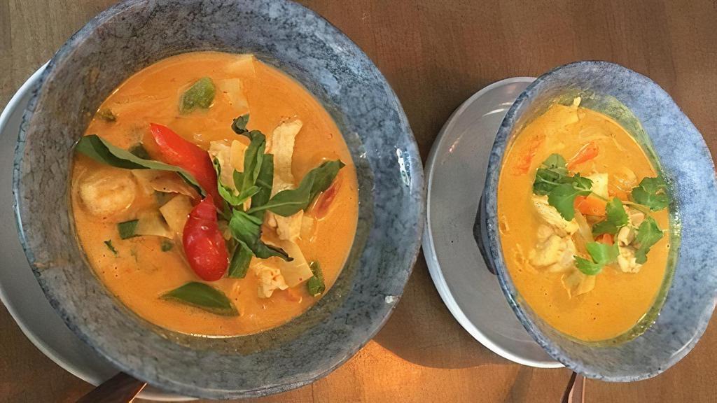 Red Curry Shrimp · (Gluten-Free) Choice of protein simmered in coconut milk, red curry, bamboo shoots, Thai basil, and zucchini
