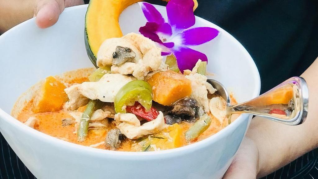 Pumpkin Curry with Pork · (Gluten-Free) Choice of protein simmered in coconut milk, red curry, pumpkin, bell pepper, carrots, Thai basil, and zucchini