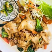 Pad See Ew with Veggies · Wok-fried rice noodles sautéed with egg, broccoli, garlic, vinegar, coconut sugar, and soy s...