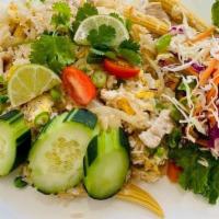 Thai Fried Rice Tofu · Thai-style fried rice with vegetables, egg, garlic, onion, green onion, and tomatoes