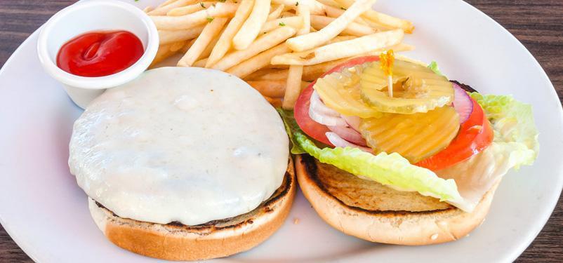 Bayern Burger · Beef burger, garnished onion, lettuce, tomato with American or Swiss cheese.iss cheese
