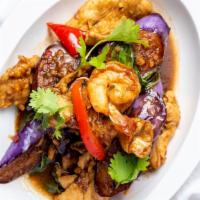 Spicy Eggplant · Sautéed eggplant with prawn, chicken, pork, bell pepper and basil in spicy ginger sauce.