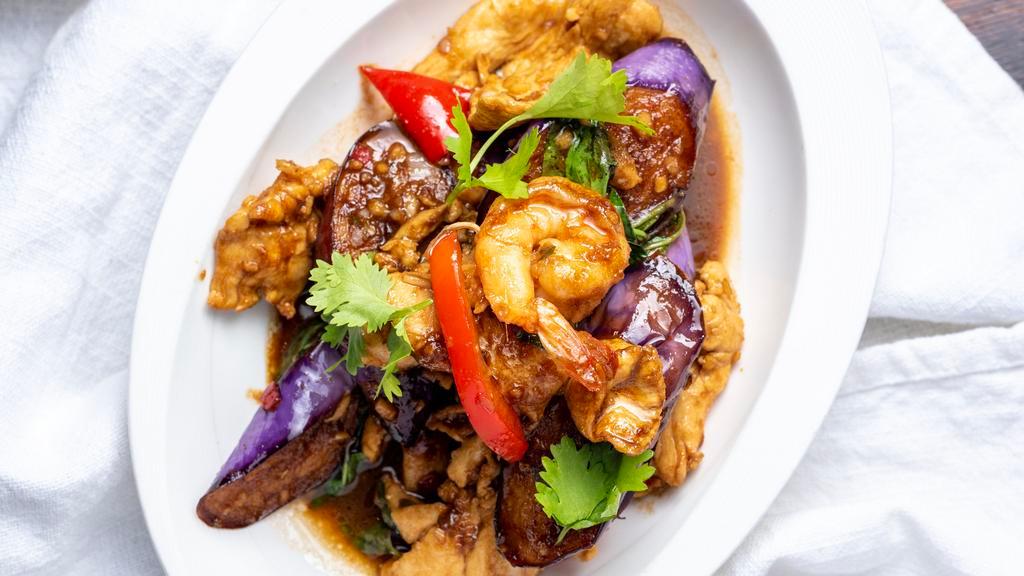 Spicy Eggplant · Sautéed eggplant, chicken, pork, shrimp, bell pepper and basil with spicy ginger sauce.