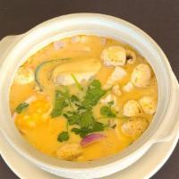 Tom Kha Talay · Combination seafood of prawn, calamari, scallop and mussel in coconut milk with red onion, m...