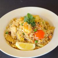 Pineapple Fried Rice · Pan – fried rice, chicken, pork, shrimp, pineapple chunk, egg, cashew nuts, onions, tomatoes...