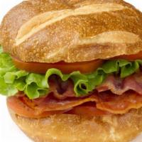 BLT Sandwich · Delicious sandwich topped with Bacon, lettuce, and tomato. Prepared to customer's order of t...