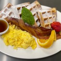 Hungarian Traditional Waffle · Crisp Hungarian waffle with two eggs any style and a choice of ham, bacon or sausage.