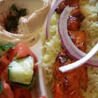 Combo Kabob · Tender boneless chicken and lam cubes marinated with Mediterranean spices and grilled to per...